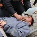 how do you deliver rescue breaths in cpr