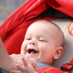 how to make an infant laugh