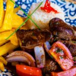 is lomo saltado healthy protein carbs sodium