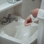 why is fluoride in drinking water and is it safe