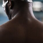 do swimming build muscle