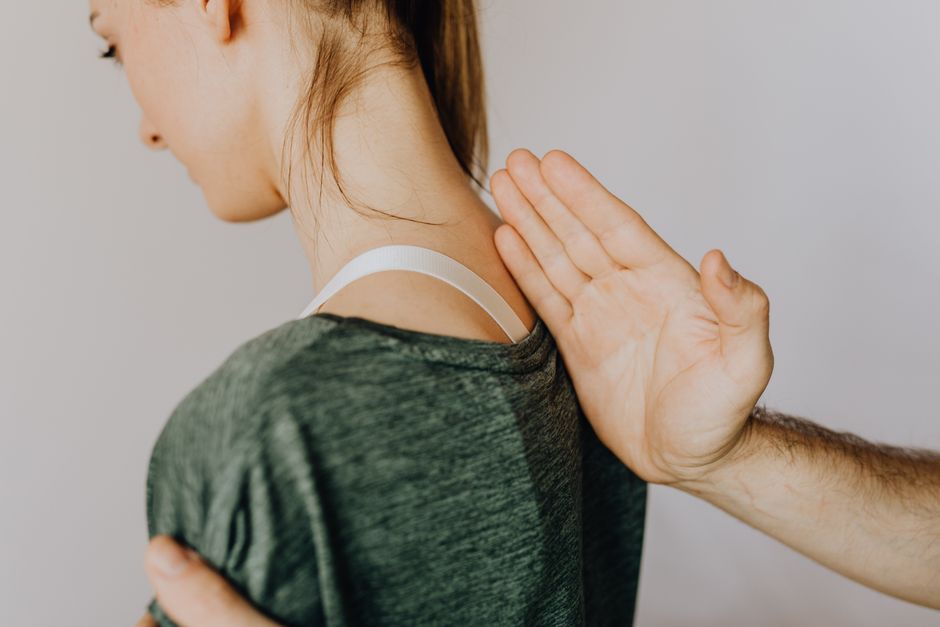 how do spinal nerves exit the vertebral column