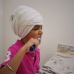 how to brush your teeth with baking soda