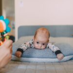 how to encourage tummy time when baby resists