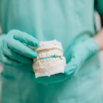 how to get used to new dentures without gagging