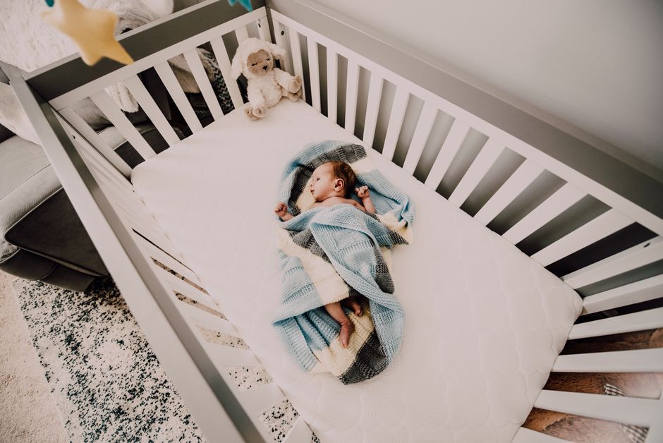 how to get your newborn to sleep in a crib