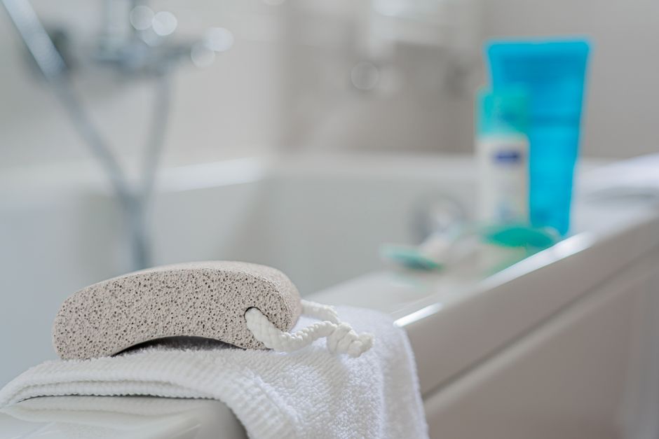 how to use a pumice stone