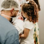 when do infants say their first word