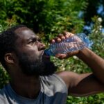 why do i sweat after drinking water