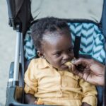 why is my baby fussy after eating causes signs