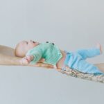 how to carry a newborn safe holds and positions