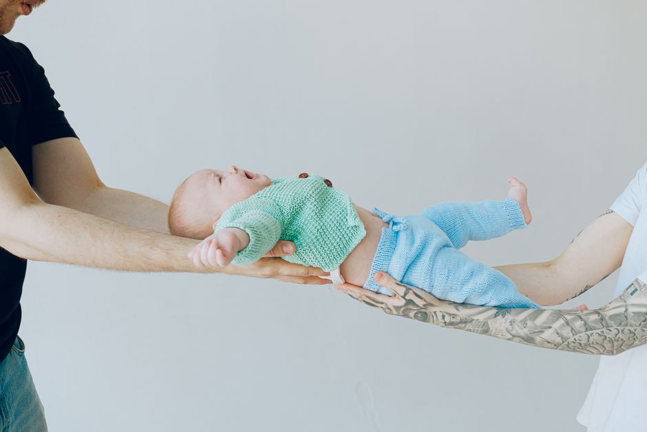 how to carry a newborn safe holds and positions