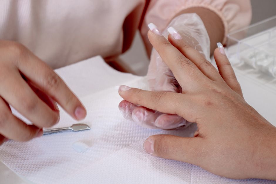 how to get nail to reattach to nail bed