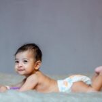 how to make a newborn smile techniques that work
