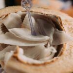 how to open a coconut without spilling the water
