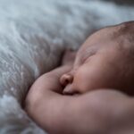 how to sleep after giving birth positions tips
