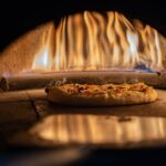 how to stop a fire in the oven before it spreads