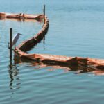 what are booms for oil spills and how do they work