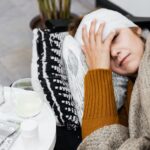 why do i get a throbbing headache when lying down
