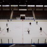 how do cameras follow hockey pucks