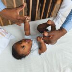 how to safely prop baby in crib risks and rules