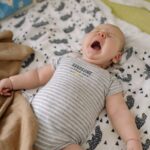 why is my newborn crying in his sleep causes fixes